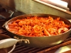 Chicken tinga cooking on the stove at Kismet Bar and Restaurant